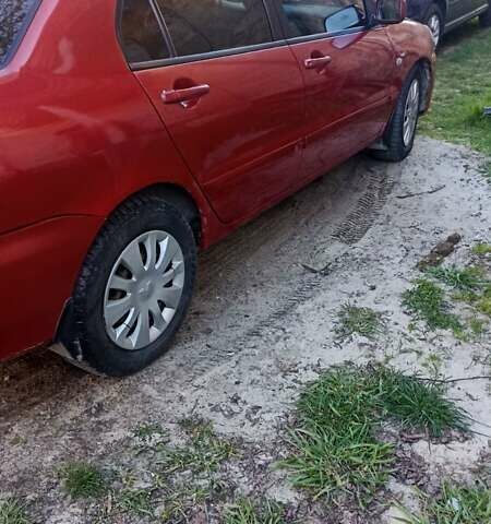 Мицубиси Лансер 2008 в Львове на Automoto.ua Красный Мицубиси Лансер, объемом двигателя 1.58 л и пробегом 280 тыс. км за 3200 $, фото 9 на Automoto.ua