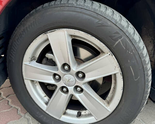 Красный Мицубиси Лансер, объемом двигателя 2 л и пробегом 365 тыс. км за 5000 $, фото 38 на Automoto.ua