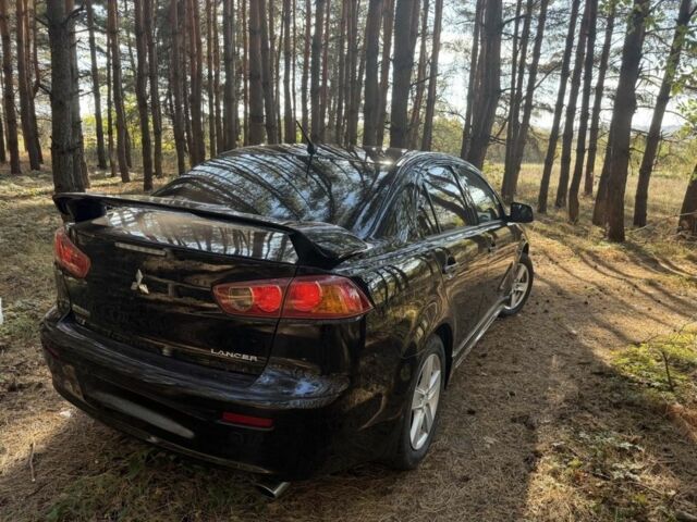 Мицубиси Лансер 2008 в Полтаве на Automoto.ua Красный Мицубиси Лансер, объемом двигателя 2 л и пробегом 170 тыс. км за 7200 $, фото 3 на Automoto.ua