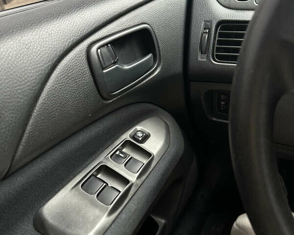 Червоний Міцубісі Lancer, об'ємом двигуна 1.6 л та пробігом 224 тис. км за 4300 $, фото 9 на Automoto.ua