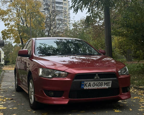Червоний Міцубісі Lancer, об'ємом двигуна 2 л та пробігом 203 тис. км за 8000 $, фото 1 на Automoto.ua