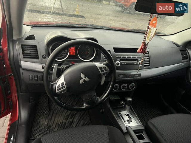 Червоний Міцубісі Lancer, об'ємом двигуна 2 л та пробігом 150 тис. км за 7000 $, фото 10 на Automoto.ua