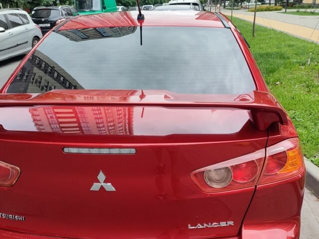 Червоний Міцубісі Lancer, об'ємом двигуна 2 л та пробігом 257 тис. км за 6900 $, фото 2 на Automoto.ua