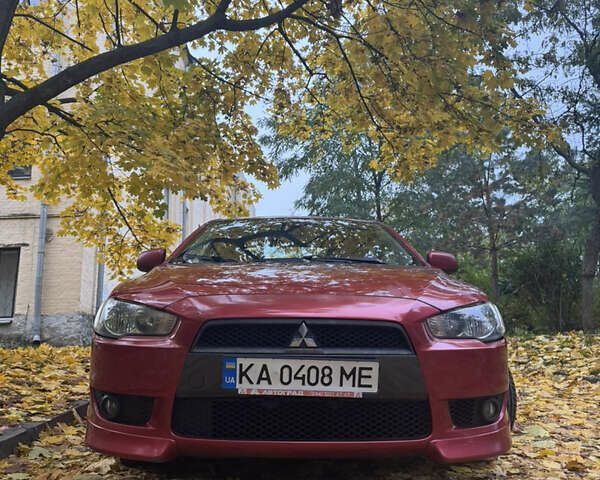 Червоний Міцубісі Lancer, об'ємом двигуна 2 л та пробігом 203 тис. км за 8000 $, фото 5 на Automoto.ua