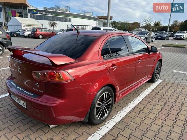 Красный Мицубиси Лансер, объемом двигателя 2 л и пробегом 227 тыс. км за 7000 $, фото 5 на Automoto.ua
