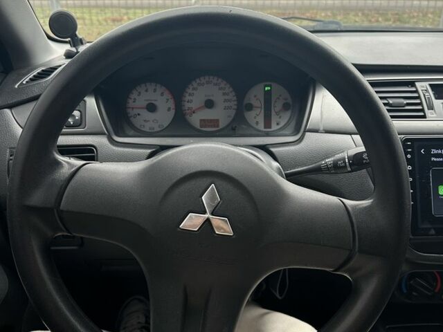 Червоний Міцубісі Lancer, об'ємом двигуна 1.6 л та пробігом 224 тис. км за 4300 $, фото 8 на Automoto.ua