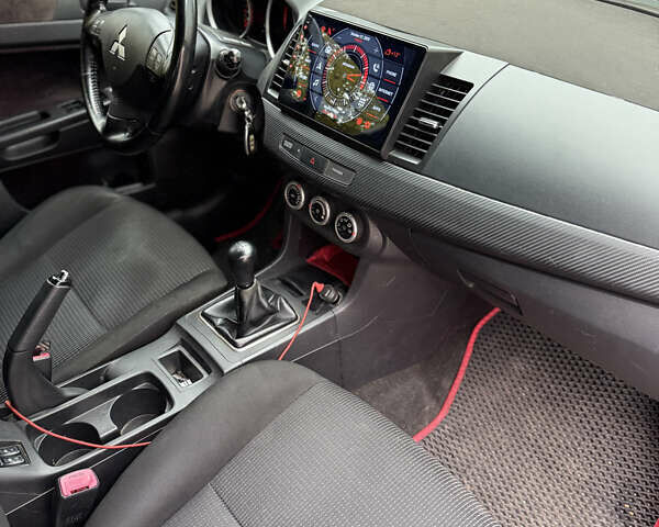 Мицубиси Лансер 2008 в Одессе на Automoto.ua Красный Мицубиси Лансер, объемом двигателя 2 л и пробегом 227 тыс. км за 8000 $, фото 7 на Automoto.ua