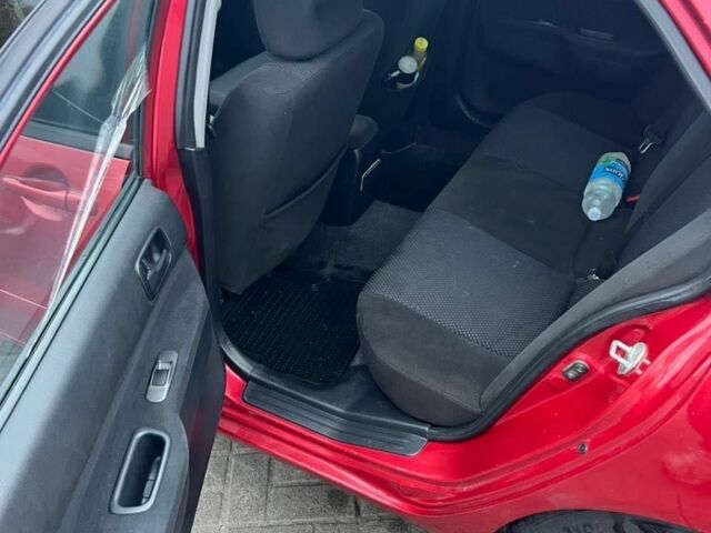 Красный Мицубиси Лансер, объемом двигателя 1.6 л и пробегом 265 тыс. км за 2956 $, фото 4 на Automoto.ua