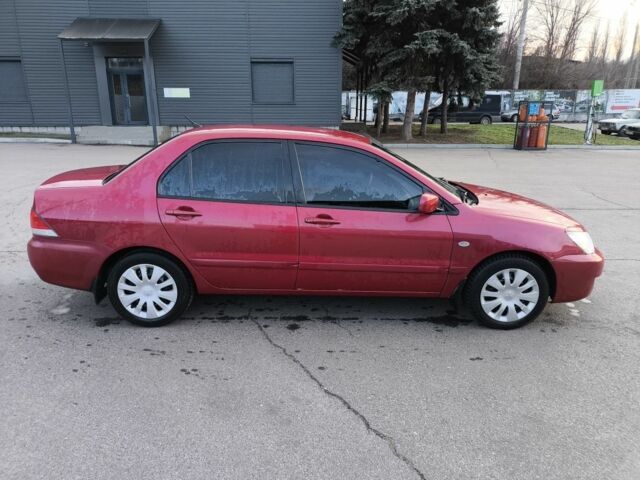 Червоний Міцубісі Lancer, об'ємом двигуна 1.6 л та пробігом 140 тис. км за 6000 $, фото 3 на Automoto.ua