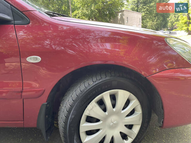 Червоний Міцубісі Lancer, об'ємом двигуна 1.6 л та пробігом 270 тис. км за 5699 $, фото 25 на Automoto.ua