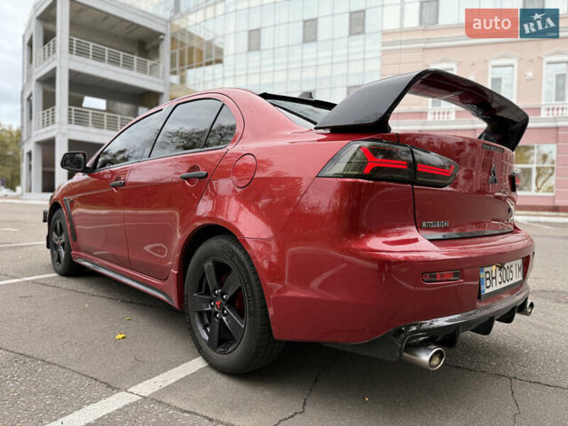 Мицубиси Лансер 2008 в Одессе на Automoto.ua Красный Мицубиси Лансер, объемом двигателя 2 л и пробегом 227 тыс. км за 8000 $, фото 6 на Automoto.ua