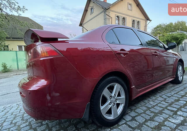 Міцубісі Lancer 2008 у Києві на Automoto.ua Червоний Міцубісі Lancer, об'ємом двигуна 2 л та пробігом 250 тис. км за 7000 $, фото 2 на Automoto.ua
