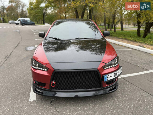 Мицубиси Лансер 2008 в Одессе на Automoto.ua Красный Мицубиси Лансер, объемом двигателя 2 л и пробегом 227 тыс. км за 8000 $, фото 5 на Automoto.ua