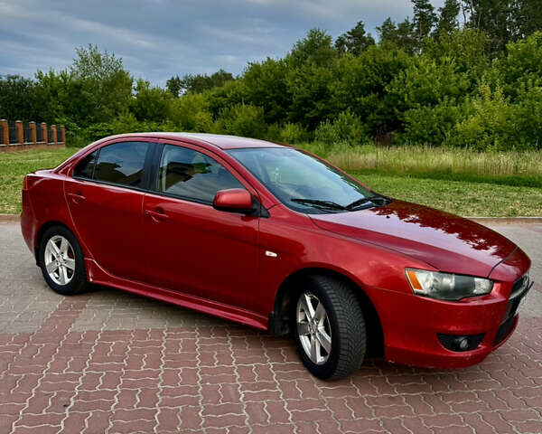 Красный Мицубиси Лансер, объемом двигателя 2 л и пробегом 365 тыс. км за 5000 $, фото 4 на Automoto.ua