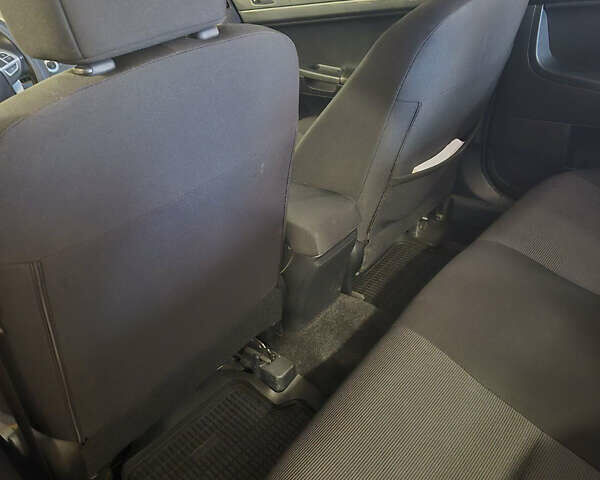 Красный Мицубиси Лансер, объемом двигателя 2 л и пробегом 65 тыс. км за 9300 $, фото 10 на Automoto.ua