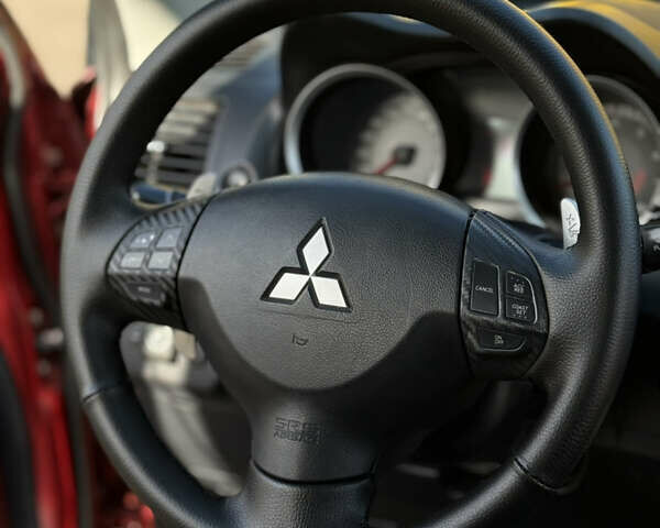 Червоний Міцубісі Lancer, об'ємом двигуна 2 л та пробігом 215 тис. км за 6500 $, фото 11 на Automoto.ua