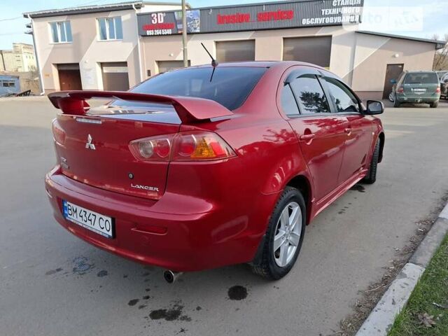 Червоний Міцубісі Lancer, об'ємом двигуна 2 л та пробігом 223 тис. км за 6950 $, фото 15 на Automoto.ua