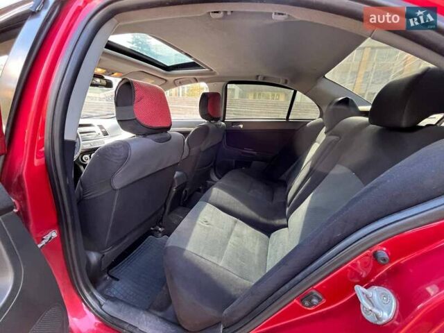 Мицубиси Лансер 2008 в Николаеве на Automoto.ua Красный Мицубиси Лансер, объемом двигателя 1.5 л и пробегом 120 тыс. км за 7000 $, фото 2 на Automoto.ua