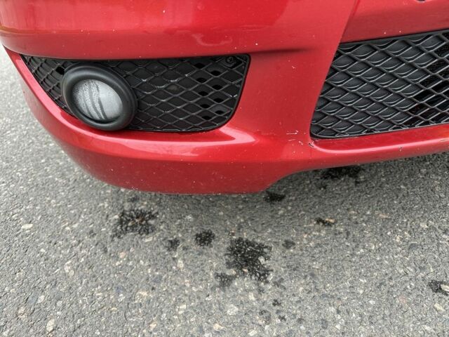 Красный Мицубиси Лансер, объемом двигателя 2 л и пробегом 366 тыс. км за 6500 $, фото 18 на Automoto.ua