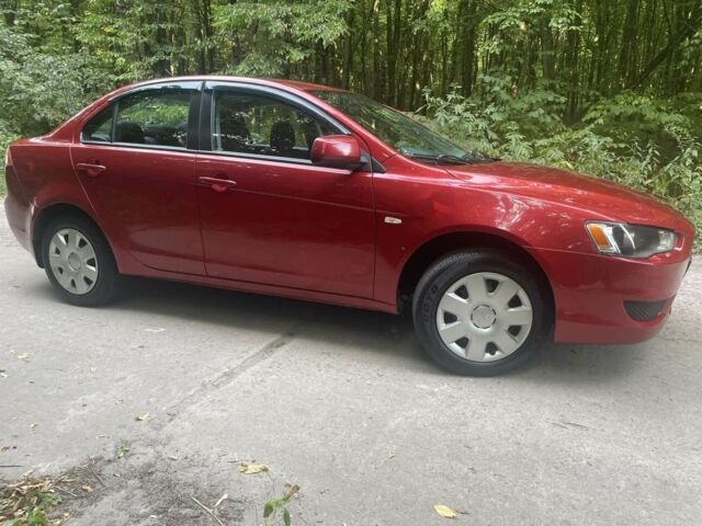 Красный Мицубиси Лансер, объемом двигателя 1.5 л и пробегом 124 тыс. км за 6300 $, фото 6 на Automoto.ua