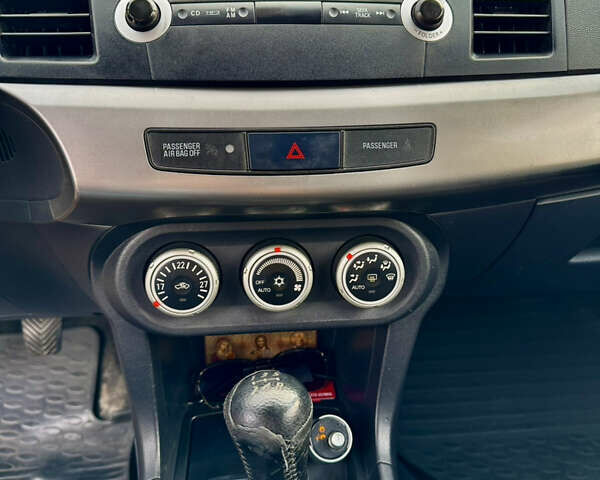 Красный Мицубиси Лансер, объемом двигателя 2 л и пробегом 365 тыс. км за 5000 $, фото 14 на Automoto.ua