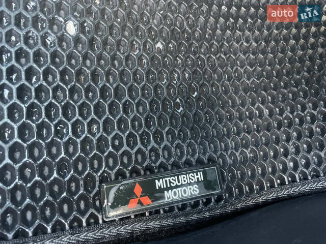 Червоний Міцубісі Lancer, об'ємом двигуна 2 л та пробігом 179 тис. км за 6499 $, фото 13 на Automoto.ua