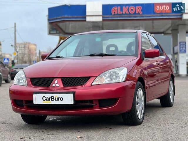 Червоний Міцубісі Lancer, об'ємом двигуна 1.58 л та пробігом 223 тис. км за 6400 $, фото 6 на Automoto.ua