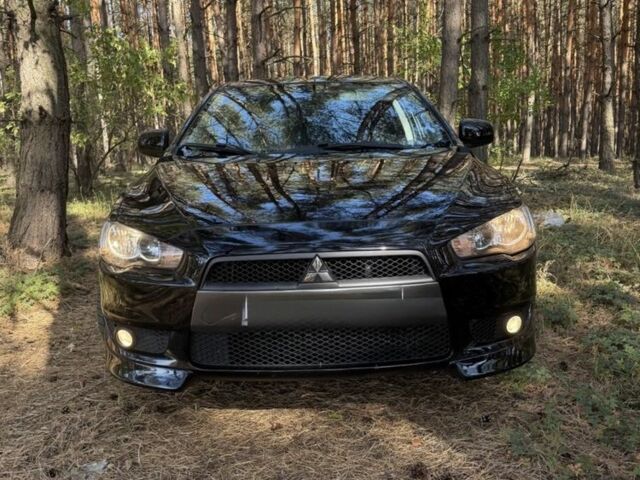 Мицубиси Лансер 2008 в Полтаве на Automoto.ua Красный Мицубиси Лансер, объемом двигателя 2 л и пробегом 170 тыс. км за 7200 $, фото 7 на Automoto.ua