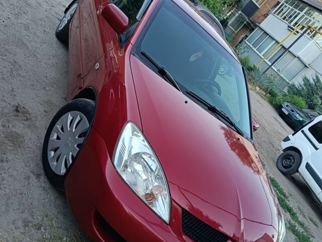 Червоний Міцубісі Lancer, об'ємом двигуна 1.6 л та пробігом 227 тис. км за 5300 $, фото 5 на Automoto.ua