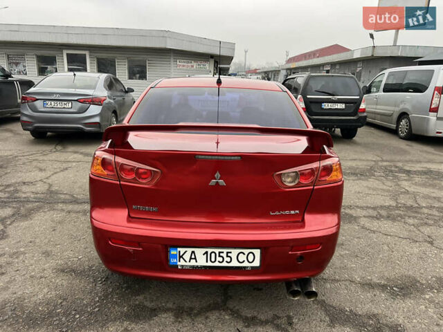 Красный Мицубиси Лансер, объемом двигателя 2 л и пробегом 330 тыс. км за 5250 $, фото 10 на Automoto.ua