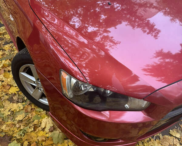 Червоний Міцубісі Lancer, об'ємом двигуна 2 л та пробігом 203 тис. км за 8000 $, фото 9 на Automoto.ua