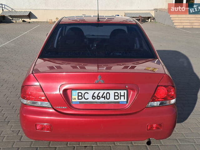 Красный Мицубиси Лансер, объемом двигателя 1.6 л и пробегом 155 тыс. км за 4150 $, фото 7 на Automoto.ua