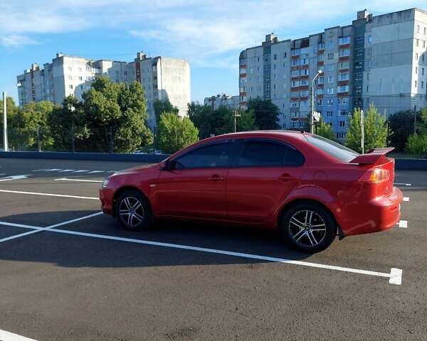 Красный Мицубиси Лансер, объемом двигателя 1.5 л и пробегом 151 тыс. км за 6000 $, фото 2 на Automoto.ua