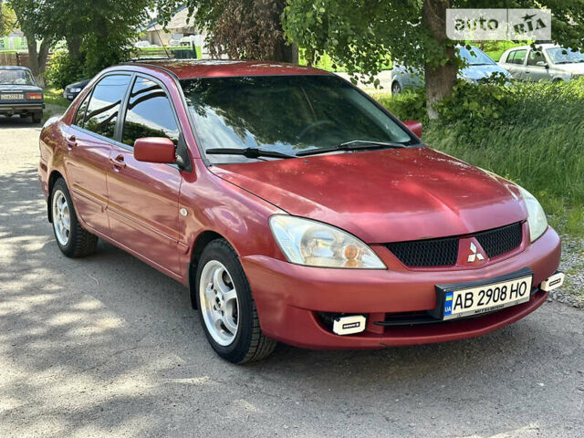 Червоний Міцубісі Lancer, об'ємом двигуна 1.6 л та пробігом 278 тис. км за 3699 $, фото 5 на Automoto.ua