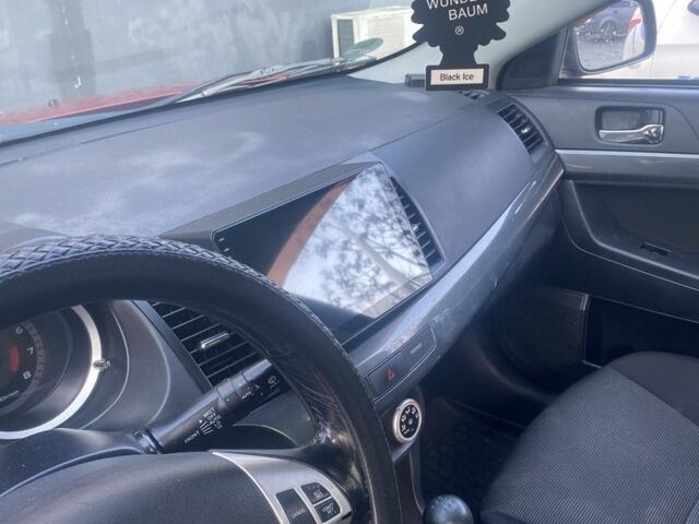 Червоний Міцубісі Lancer, об'ємом двигуна 2 л та пробігом 200 тис. км за 5350 $, фото 3 на Automoto.ua