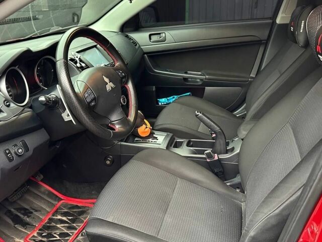 Червоний Міцубісі Lancer, об'ємом двигуна 2 л та пробігом 137 тис. км за 8500 $, фото 7 на Automoto.ua