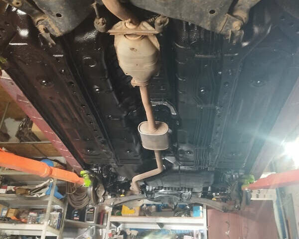 Красный Мицубиси Лансер, объемом двигателя 1.6 л и пробегом 192 тыс. км за 5999 $, фото 12 на Automoto.ua