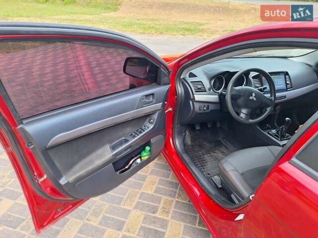 Красный Мицубиси Лансер, объемом двигателя 1.5 л и пробегом 227 тыс. км за 6700 $, фото 4 на Automoto.ua