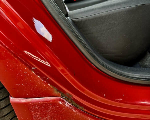 Красный Мицубиси Лансер, объемом двигателя 2 л и пробегом 365 тыс. км за 5000 $, фото 26 на Automoto.ua