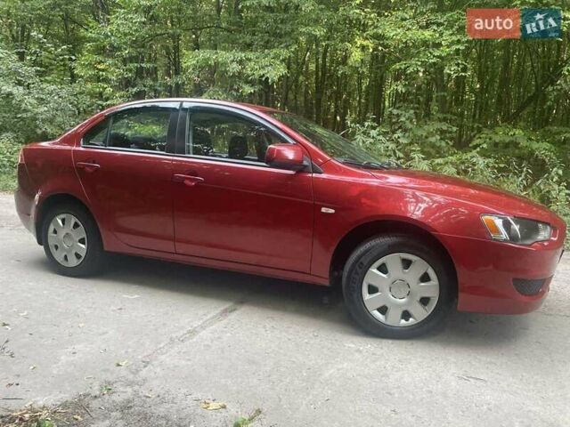 Красный Мицубиси Лансер, объемом двигателя 1.5 л и пробегом 124 тыс. км за 7100 $, фото 3 на Automoto.ua