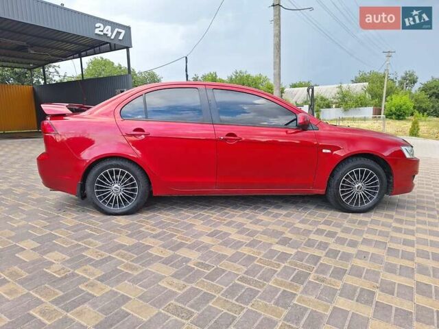 Красный Мицубиси Лансер, объемом двигателя 1.5 л и пробегом 227 тыс. км за 6700 $, фото 10 на Automoto.ua