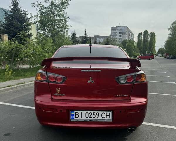 Червоний Міцубісі Lancer, об'ємом двигуна 2 л та пробігом 188 тис. км за 7390 $, фото 7 на Automoto.ua