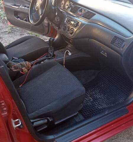 Мицубиси Лансер 2008 в Львове на Automoto.ua Красный Мицубиси Лансер, объемом двигателя 1.58 л и пробегом 280 тыс. км за 3200 $, фото 6 на Automoto.ua