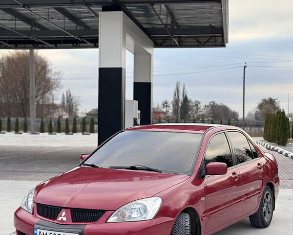 Красный Мицубиси Лансер, объемом двигателя 1.6 л и пробегом 276 тыс. км за 4550 $, фото 2 на Automoto.ua