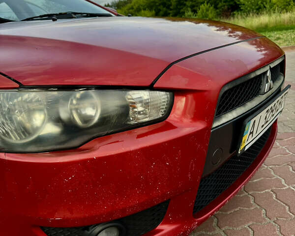 Красный Мицубиси Лансер, объемом двигателя 2 л и пробегом 365 тыс. км за 5000 $, фото 8 на Automoto.ua