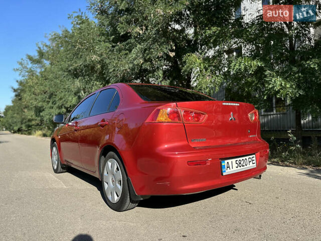 Красный Мицубиси Лансер, объемом двигателя 1.5 л и пробегом 265 тыс. км за 6200 $, фото 6 на Automoto.ua