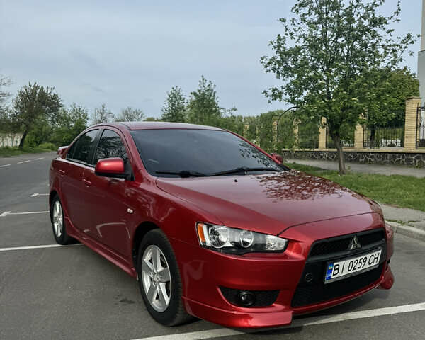 Червоний Міцубісі Lancer, об'ємом двигуна 2 л та пробігом 188 тис. км за 7390 $, фото 1 на Automoto.ua