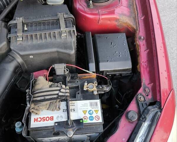 Червоний Міцубісі Lancer, об'ємом двигуна 1.58 л та пробігом 140 тис. км за 6000 $, фото 29 на Automoto.ua