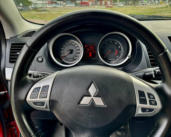 Красный Мицубиси Лансер, объемом двигателя 2 л и пробегом 365 тыс. км за 5000 $, фото 13 на Automoto.ua