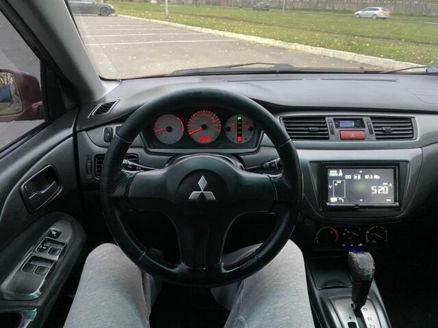 Червоний Міцубісі Lancer, об'ємом двигуна 1.6 л та пробігом 385 тис. км за 4500 $, фото 6 на Automoto.ua